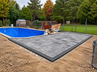 Angular Pool Paver Deck Installation — Photo 1