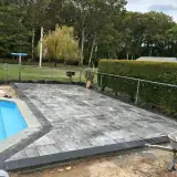Gray Paver Pool-Deck Installation: gray paver pool deck installation view two