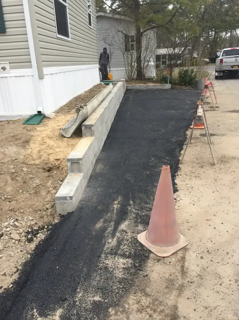 Asphalt Walkway and Stone Curb Repair - After