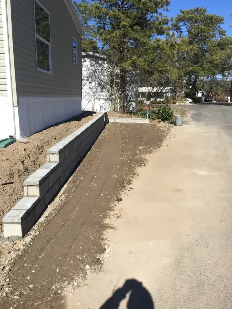 Asphalt Walkway and Stone Curb Repair - Before