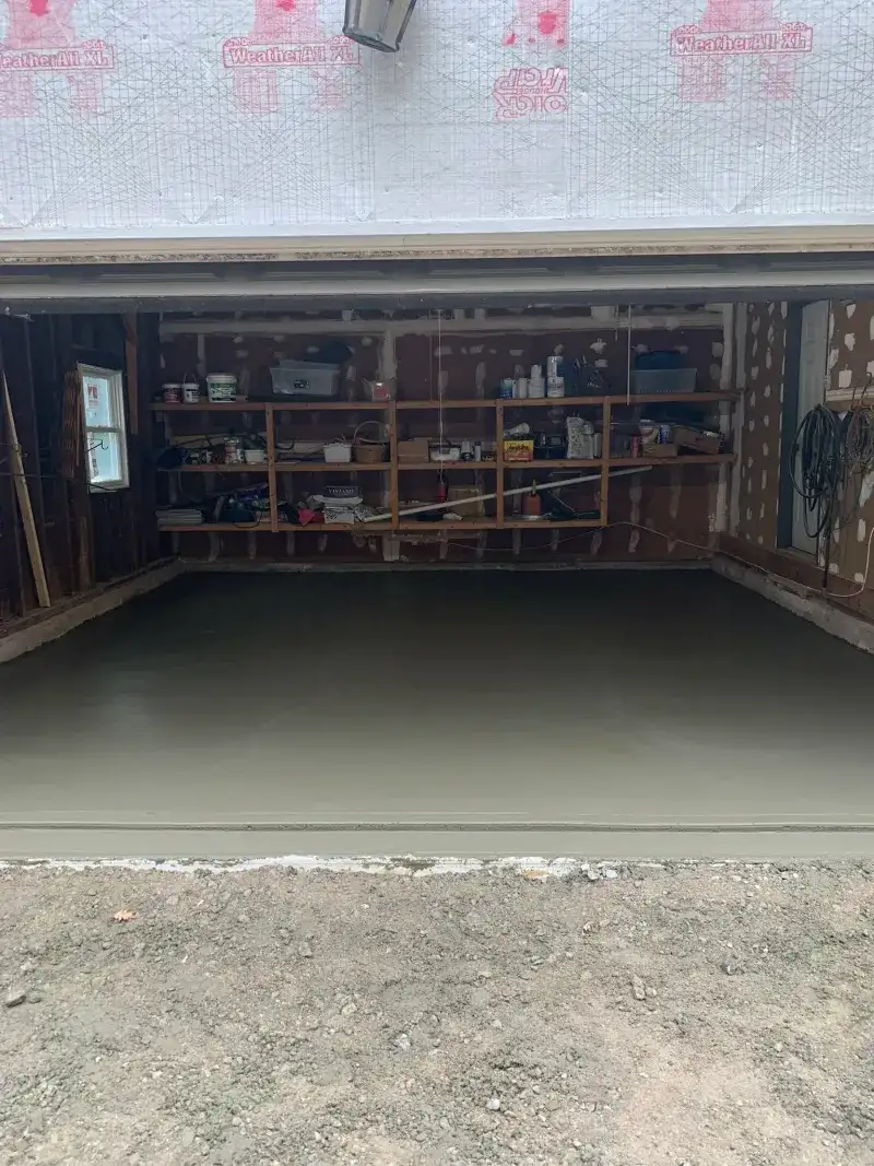 Single-Car Garage Slab Pour: single car garage concrete slab fresh pour