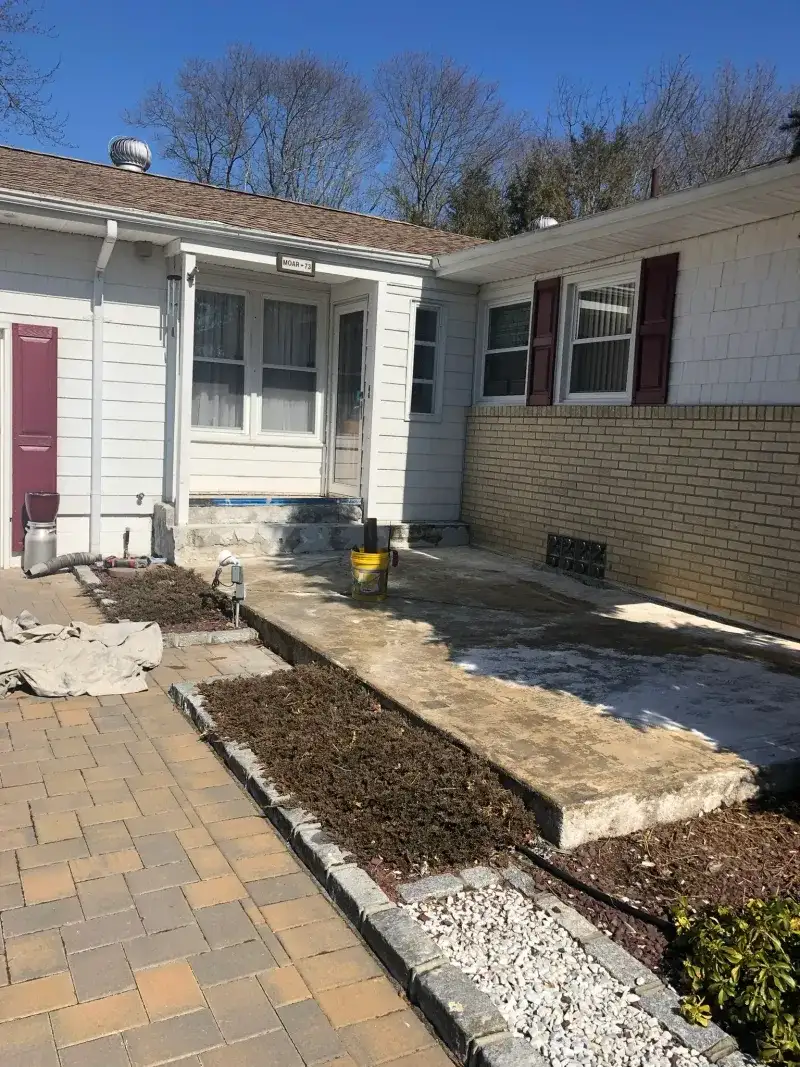 Patio Demolition and Concrete Base: mixed paver patio before removal