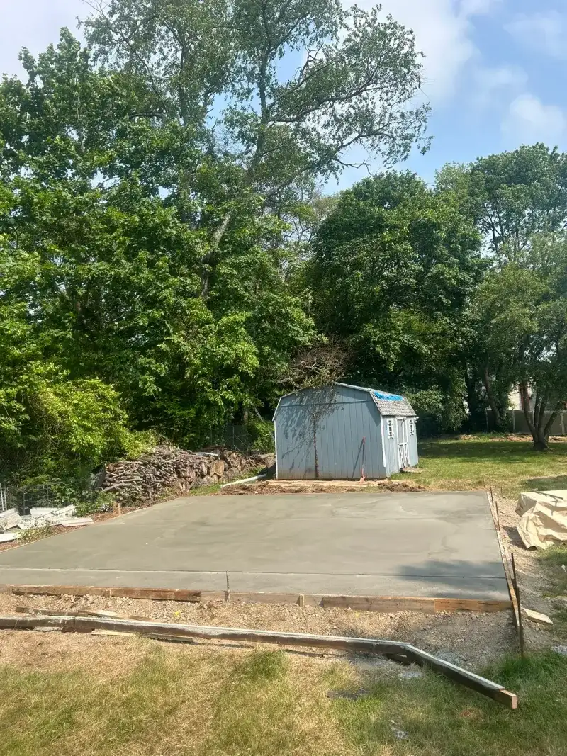 Detached Garage Foundation and Steel Frame - Before